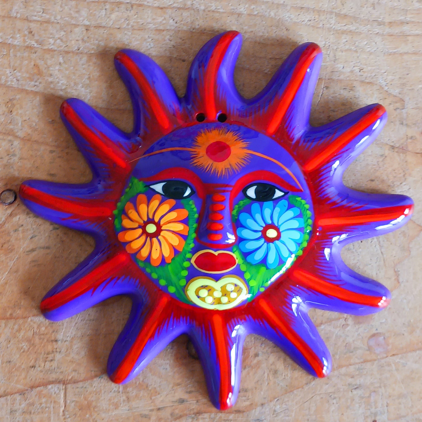 Add a burst of colour with this vibrant, hand-painted Xalitla wall plaque. Traditional Mexican folk art with a glossy finish and easy hanging design.