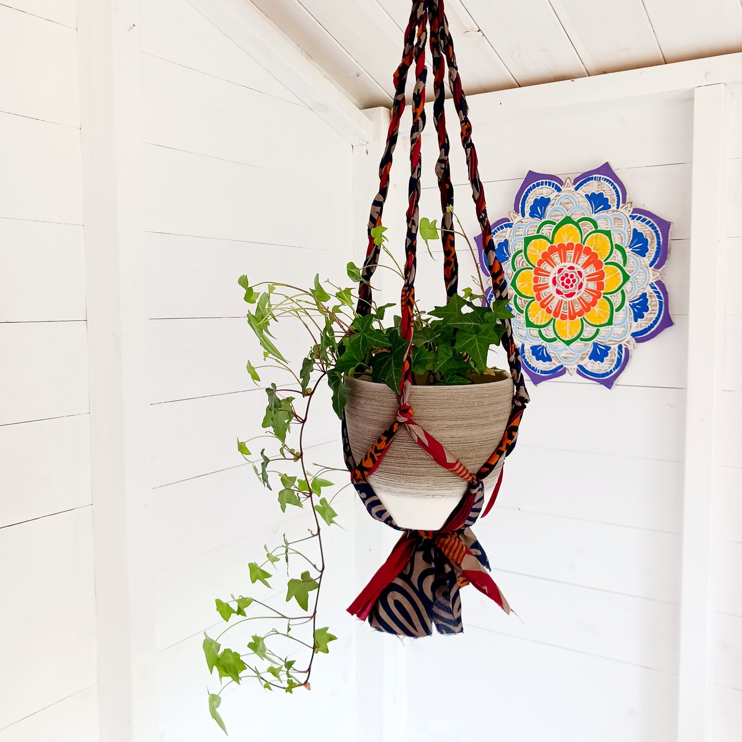 These beautiful sari plant hangers will add a splash of colour and boho chic to your home. Made from scraps of used sari, their simple design ensures that no fabric is wasted but is re-purposed into an elegant product.