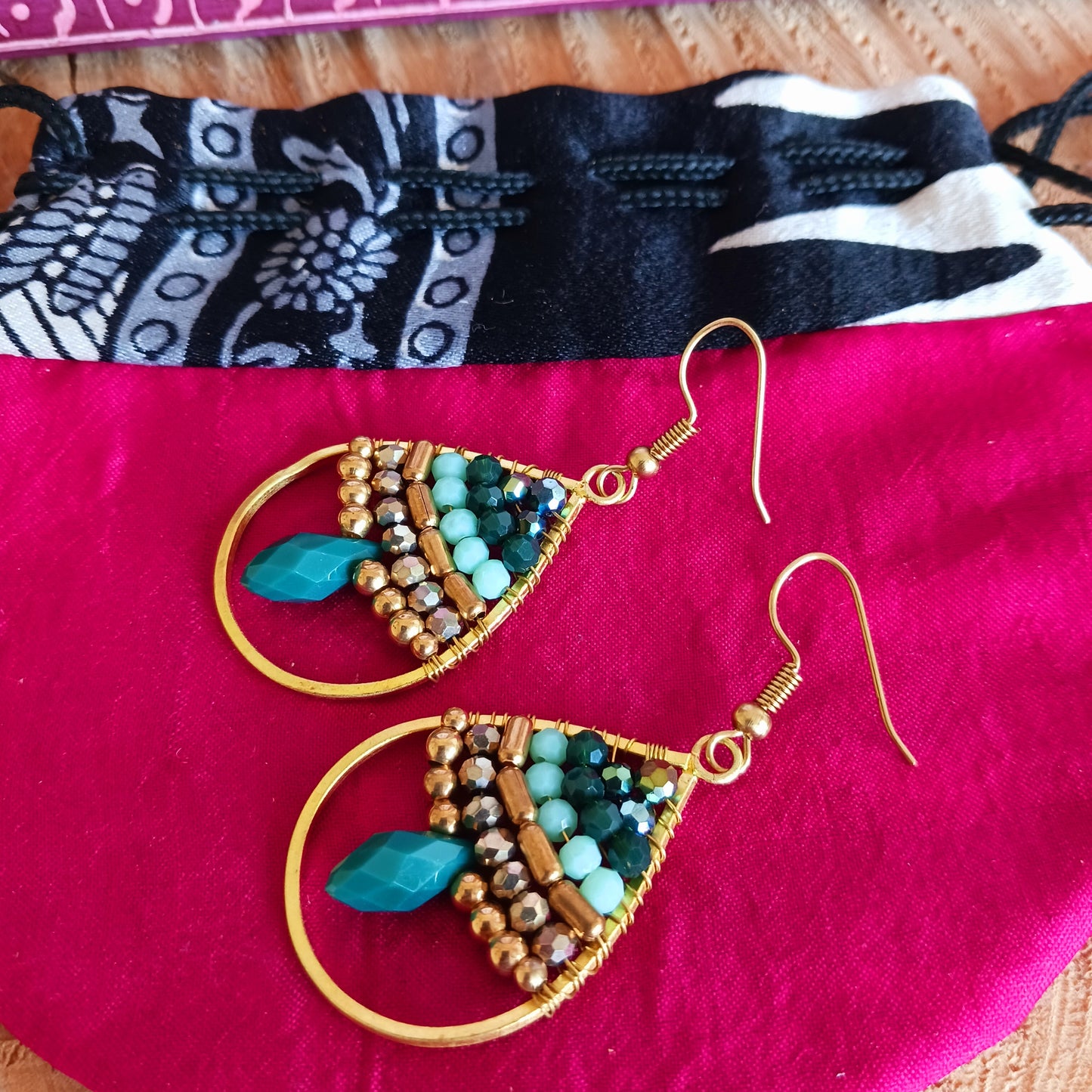 These pretty beaded earrings are so bohemian chic and add effortless style to your outfit. The beads sparkle gently when the light catches them, making them a great evening accessory as well as daytime. They are finished with gold plated hooks.
