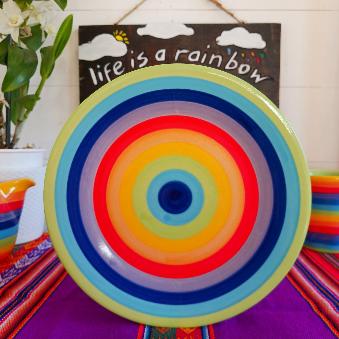 These wonderfully cheerful, rainbow stripe side plates brighten up any meal. The vibrant stripes are hand painted giving each piece individual character.