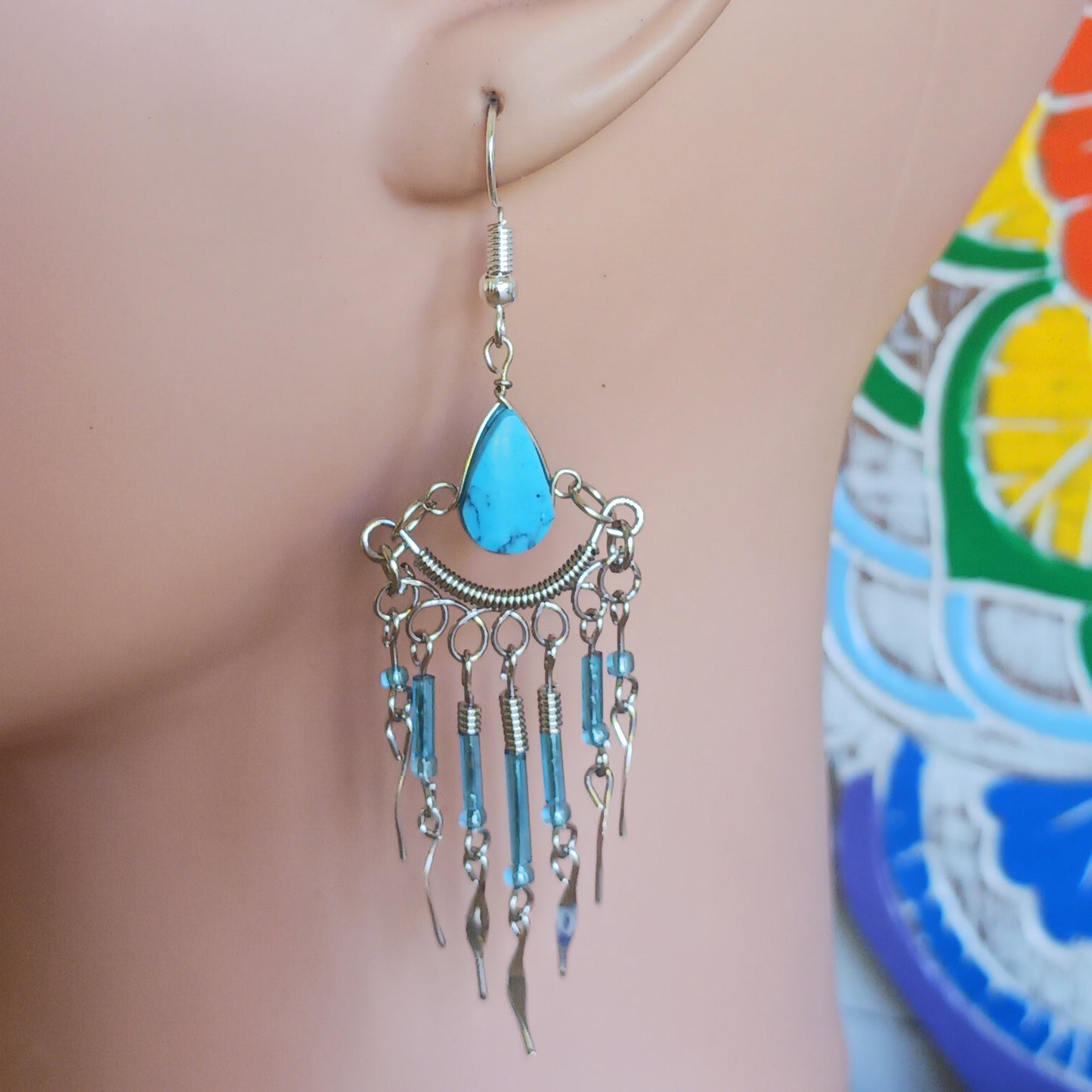 These beautiful hoop earrings incorporate Peruvian Turquoise Stone with Silver plated hooks. They have been hand made in Peru and are presented in a traditionally made pouch, gift wrapped and ready to give☸