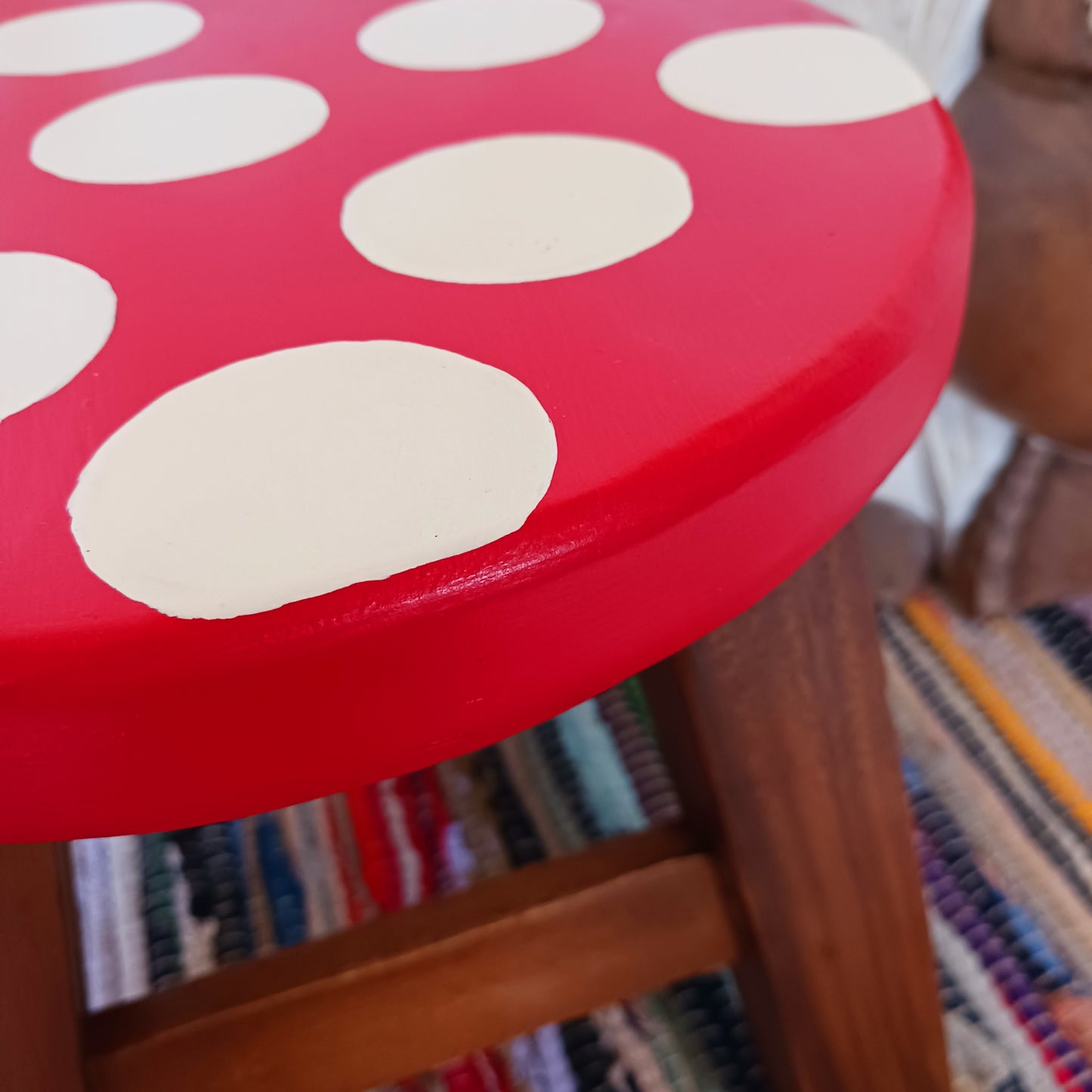 This cute little stool has been hand painted to look like a mushroom! These cheeky little items are very versatile making great stools for little bums or as tiny tables to add accent to your home. They can also be very useful as a step for those hard to reach high up shelves or even just to put your feet up on, and due to their small form are easy to store.