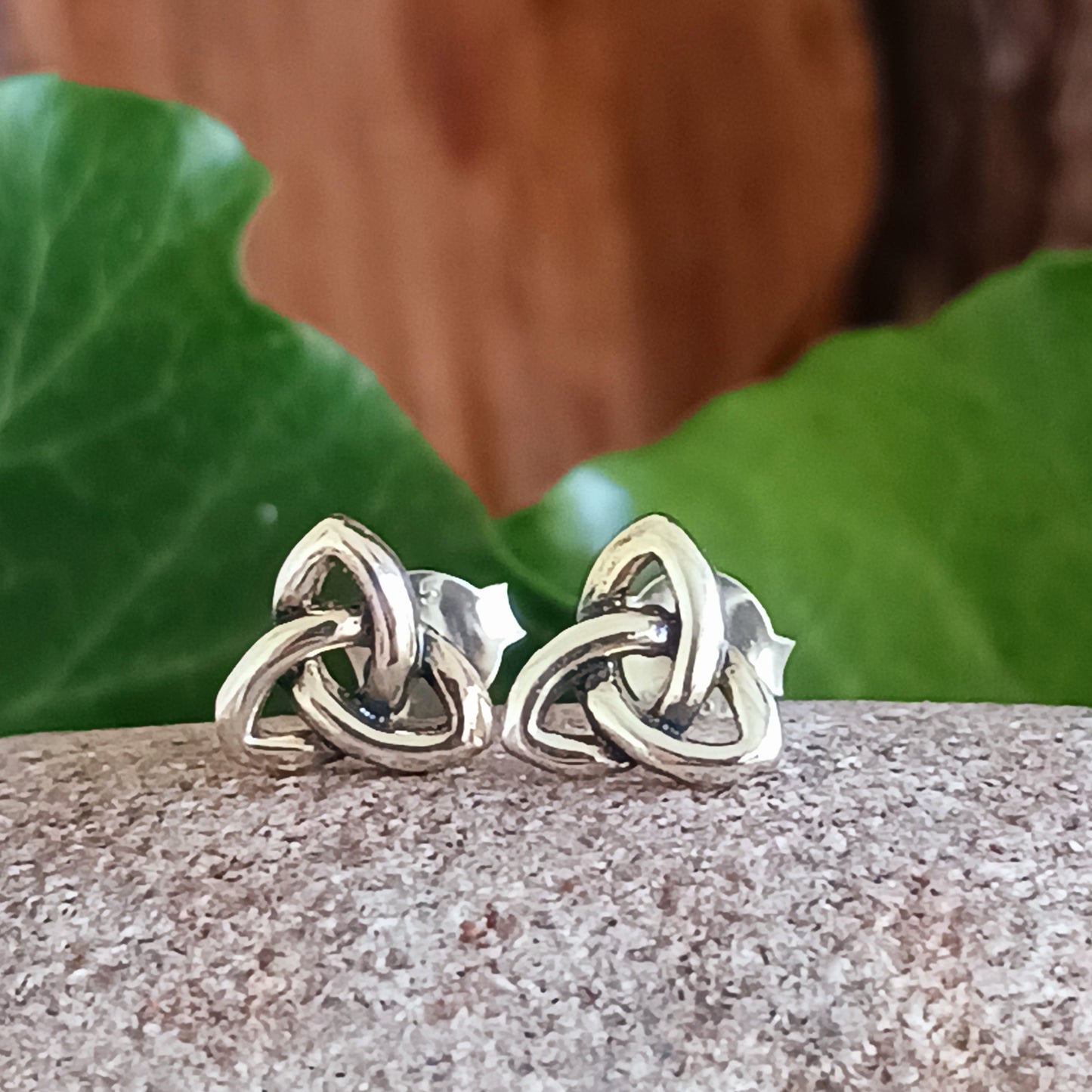 Beautifully crafted 925 sterling silver Celtic stud earrings, featuring ancient Celtic Knot artwork translated into intricate jewellery. A timeless piece, rich in history and symbolic meaning.