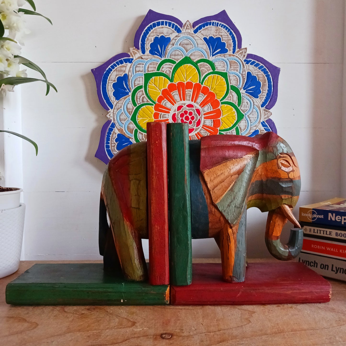 These beautiful bookends feature one of the most beloved creatures on earth, the majestic elephant. They have been skillfully hand carved, painted and finished with a lovely rustic effect. An ideal way to keep your books neat and tidy and they make a super gift too!