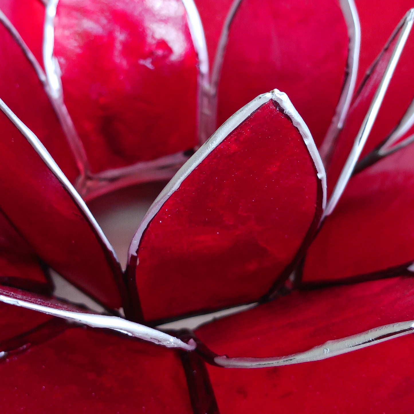 The Lotus Flower is a symbol of achieving enlightenment, peacefulness and spirituality. This beautiful candle holder can be fitted with tealight candles or slightly larger candles. The diameter of the middle is roughly 5.5cm, so it will fit any candle with the same diameter.