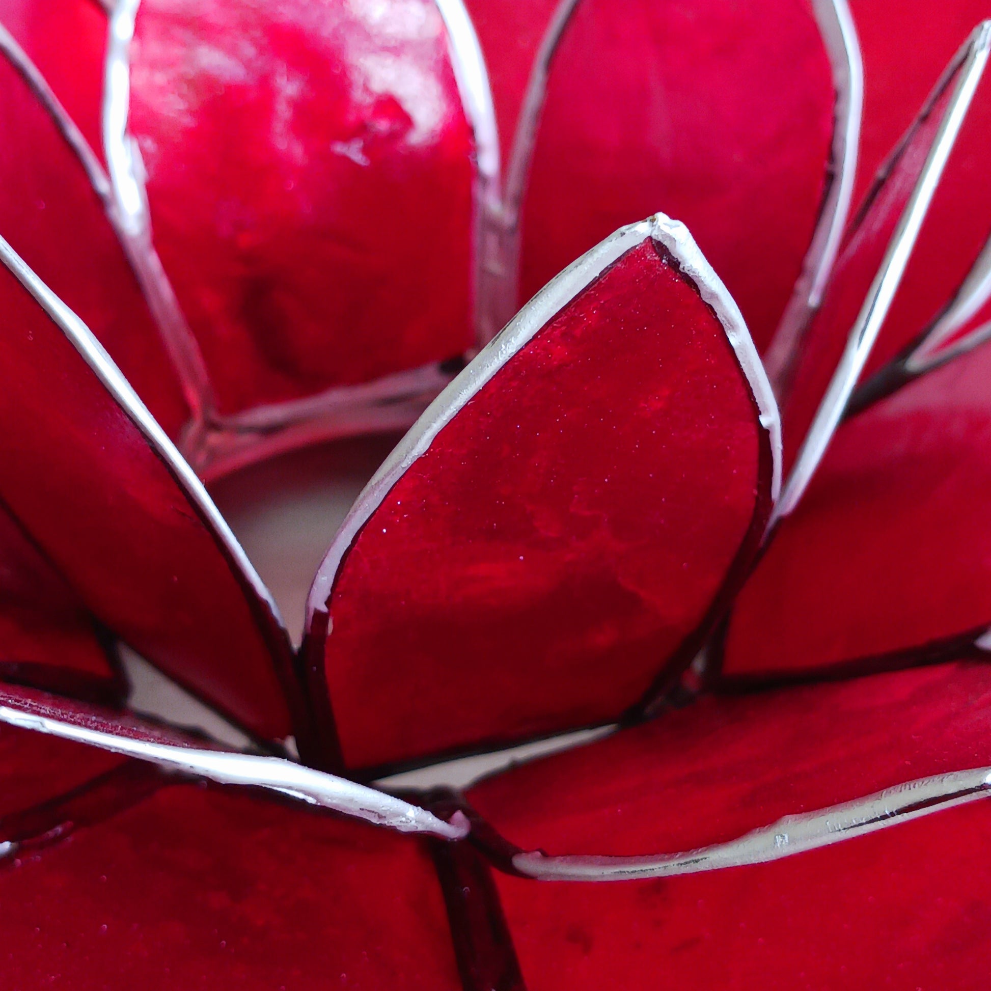 The Lotus Flower is a symbol of achieving enlightenment, peacefulness and spirituality. This beautiful candle holder can be fitted with tealight candles or slightly larger candles. The diameter of the middle is roughly 5.5cm, so it will fit any candle with the same diameter.