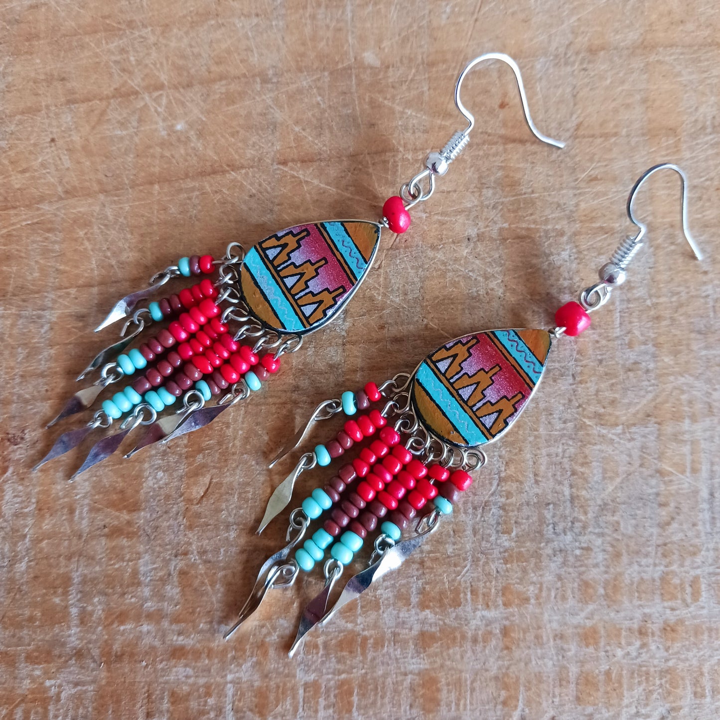Handmade Incan teardrop earrings with traditional patterns & silver hooks. Ethically made in Peru. Unique, vibrant & perfect for Boho or gift giving.