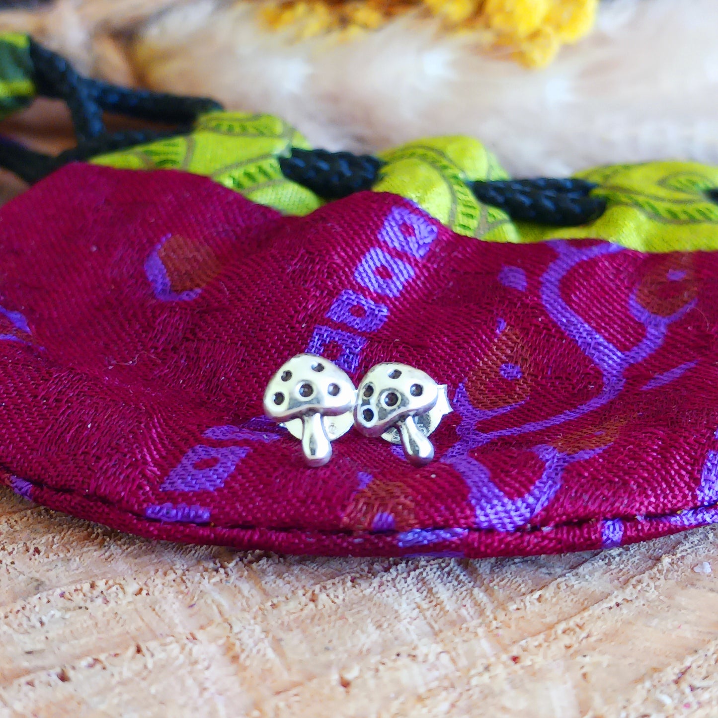 These Mushroom 925 Sterling Silver Ear Studs are the perfect accessory for any outfit. Crafted from 925 sterling silver, they feature a stylish 6mm x 5mm mushroom design and come presented in a beautiful recycled sari gift pouch.