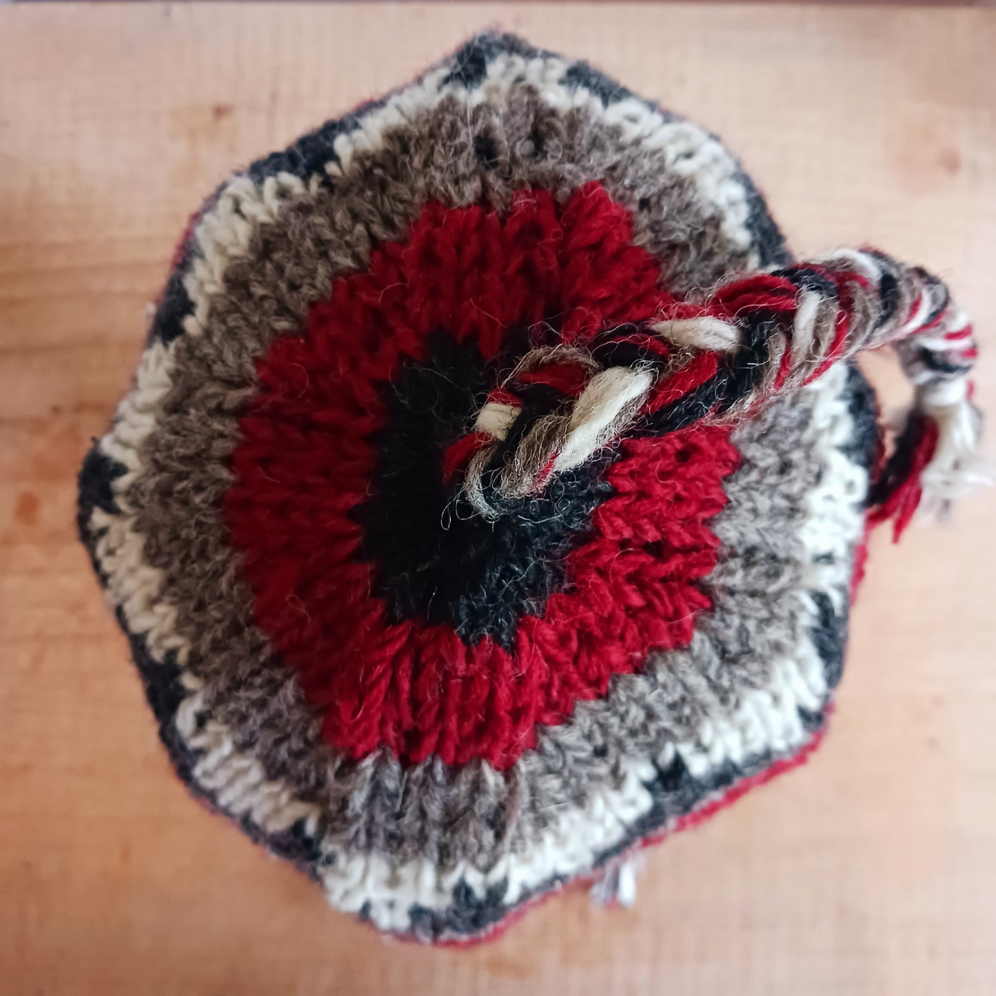 Stay cozy and stylish with our handmade chunky wool earflap hats, crafted in Nepal by skilled women artisans in Kathmandu. Each hat is 100% pure wool and features a soft polar fleece lining for extra warmth and comfort. Perfect for cold winter days, outdoor adventures, or adding a touch of handmade charm to your look.