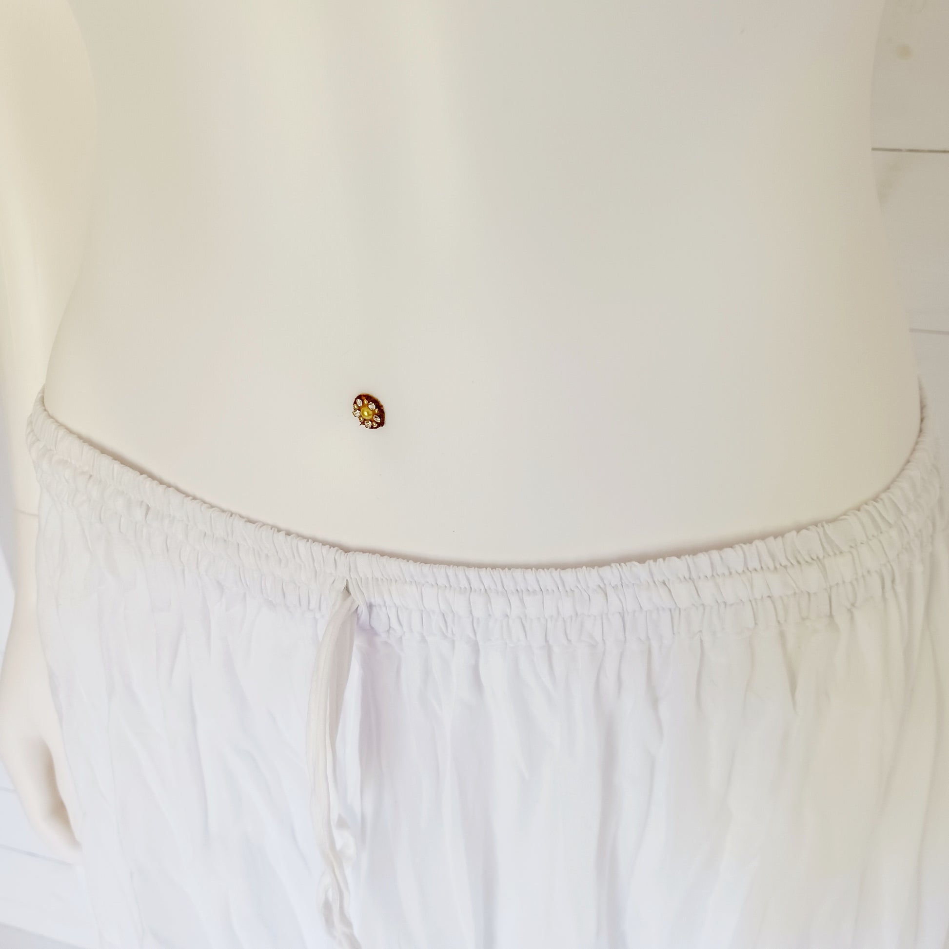 This beautiful Indian crinkle skirt is lovely and light so you can move with ease and comfort on a sunny day or a hot night. Made from rayon crepe, you can’t go wrong with this lovely skirt, it will add to your flowing summer style. And as rayon is quick drying, it also makes this a great beach cover up skirt.