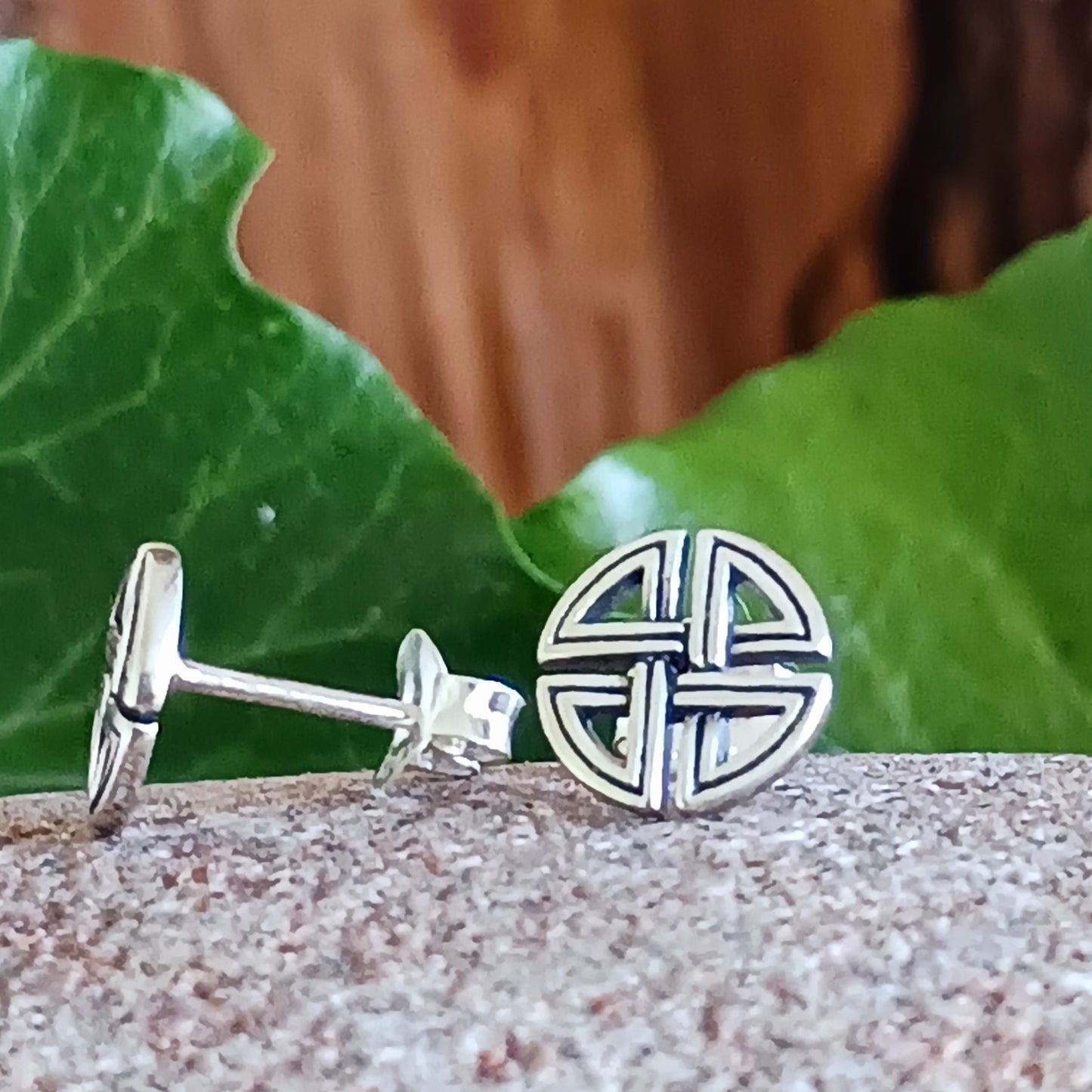 Beautifully crafted 925 sterling silver Celtic stud earrings, featuring ancient Celtic artwork translated into intricate jewellery. A timeless piece, rich in history and symbolic meaning.