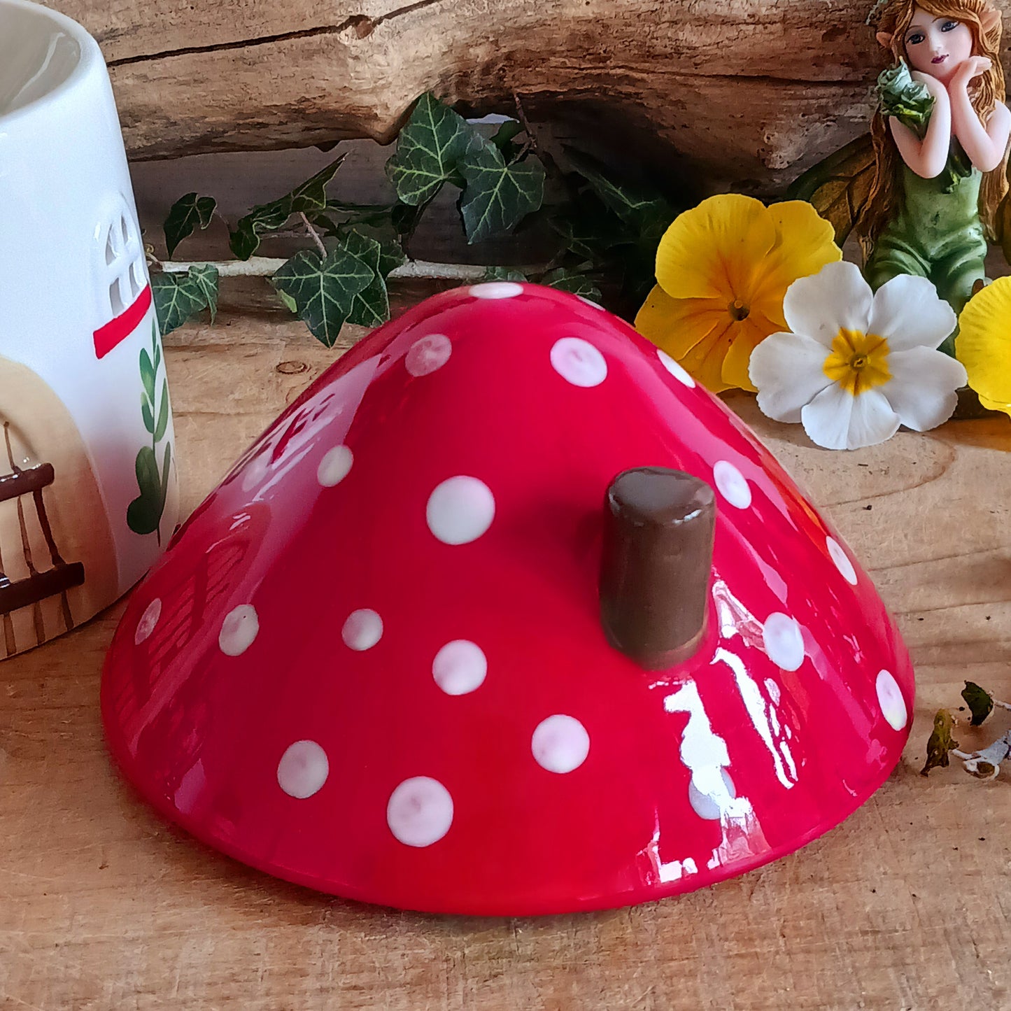 This charming mushroom house oil burner makes both a practical and eye-catching decor piece for fragrancing the home. Simply place fragrance oil diluted with water or a wax melt under the toadstool lid and light a standard tealight underneath to enjoy the calming scent.
