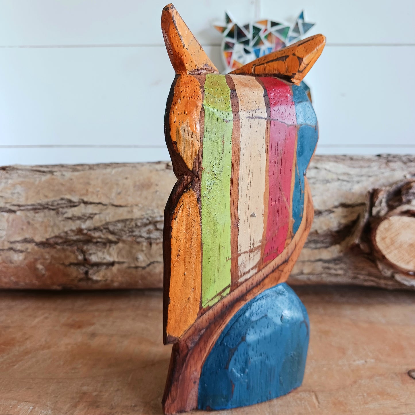 Bring a touch of nature and craftsmanship into your home with this beautifully hand-carved little wooden owl ornament. Carefully crafted from wood and finished in charming rustic colours, each owl is unique, showcasing the character and artistry of traditional woodcarving.