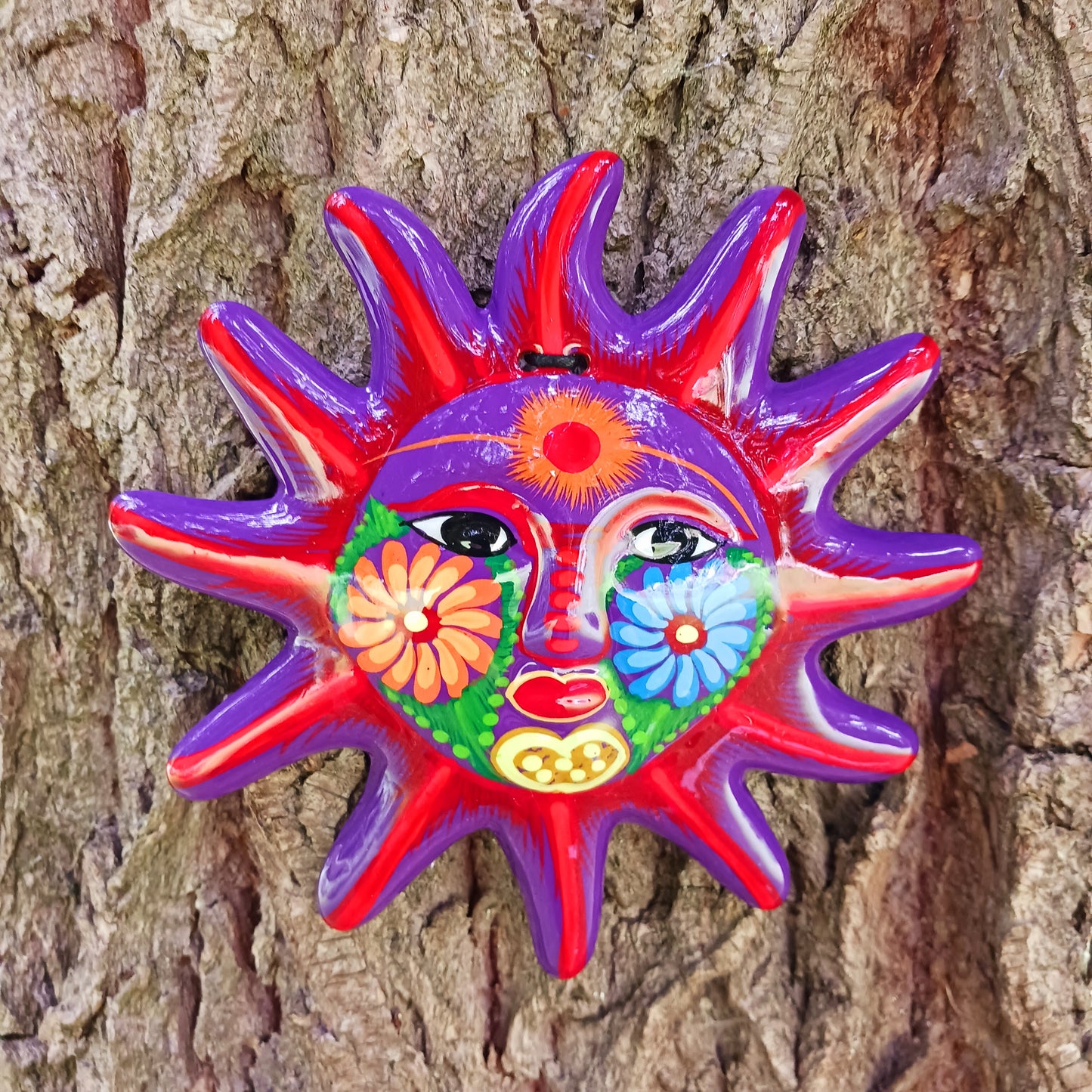 Add a burst of colour with this vibrant, hand-painted Xalitla wall plaque. Traditional Mexican folk art with a glossy finish and easy hanging design.