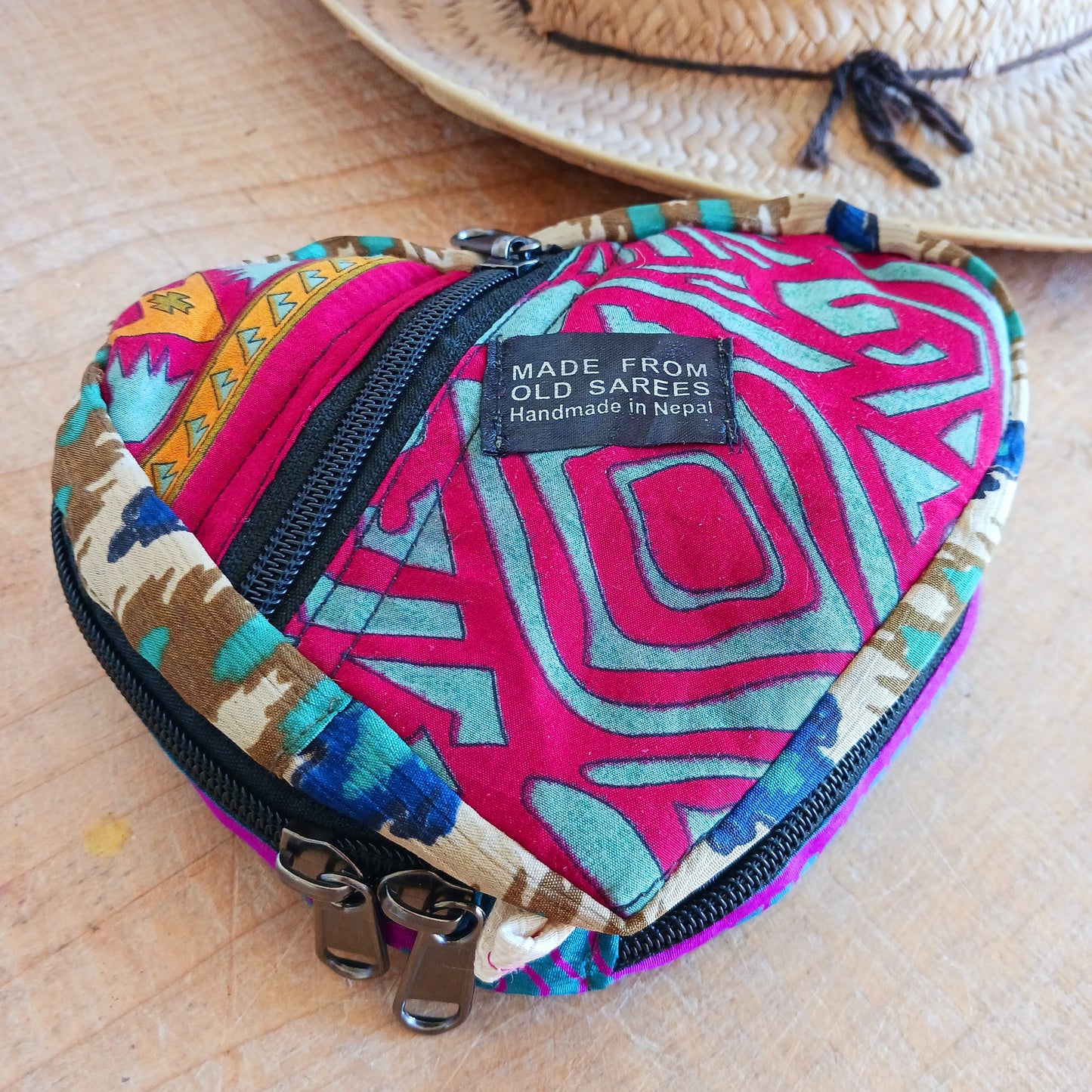 These nifty fold up backpacks are super handy. Not only do they fold down and zip away into a small compact size, but they have multiple zip and button up pouches and pockets for you to keep your essentials.