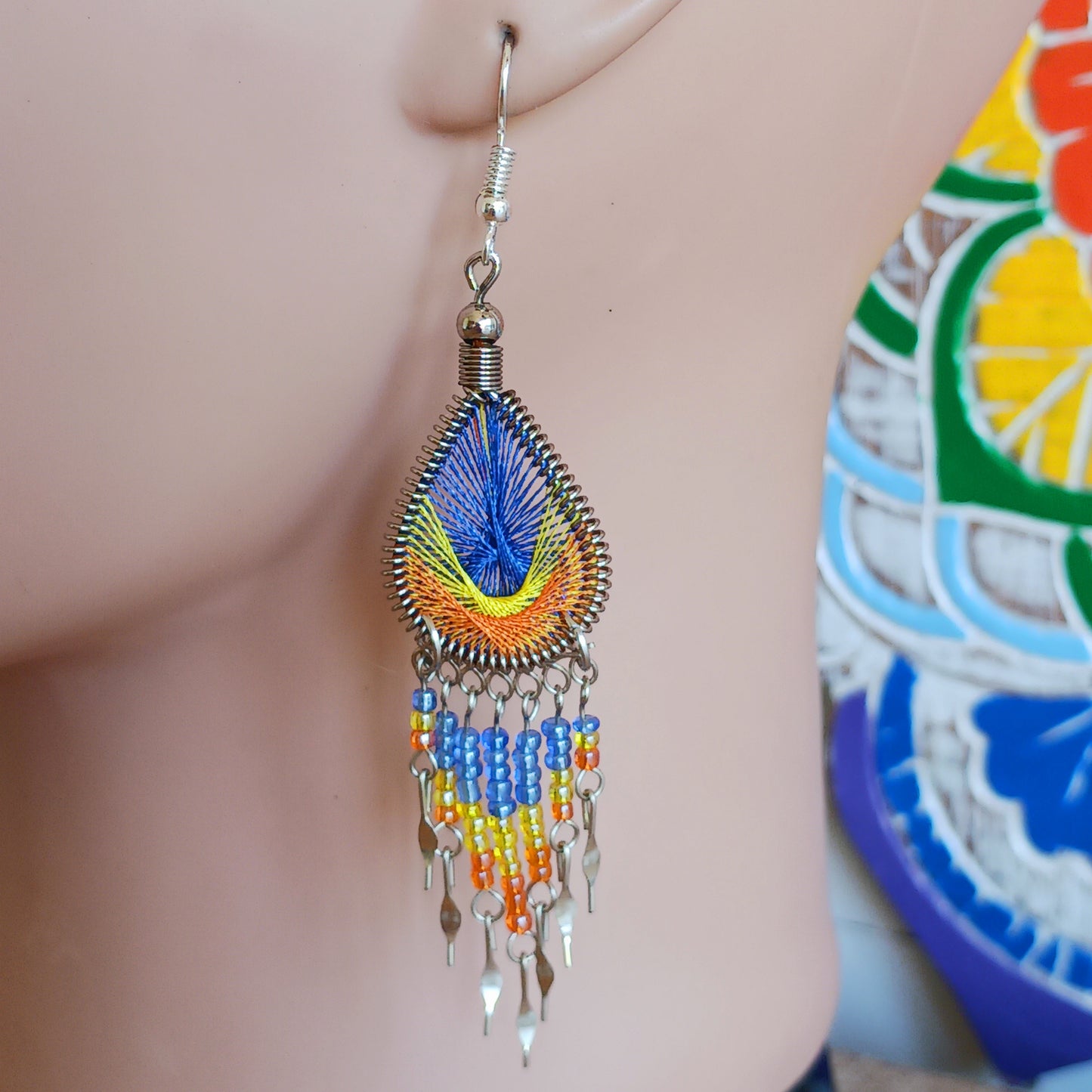 Our earrings are sourced from ethical and small family businesses, the eye-catching variation of traditional patterns and beads and contemporary detailing enhance the jewelry to make each item unique and individual, lovingly created in small workshops in Peru.