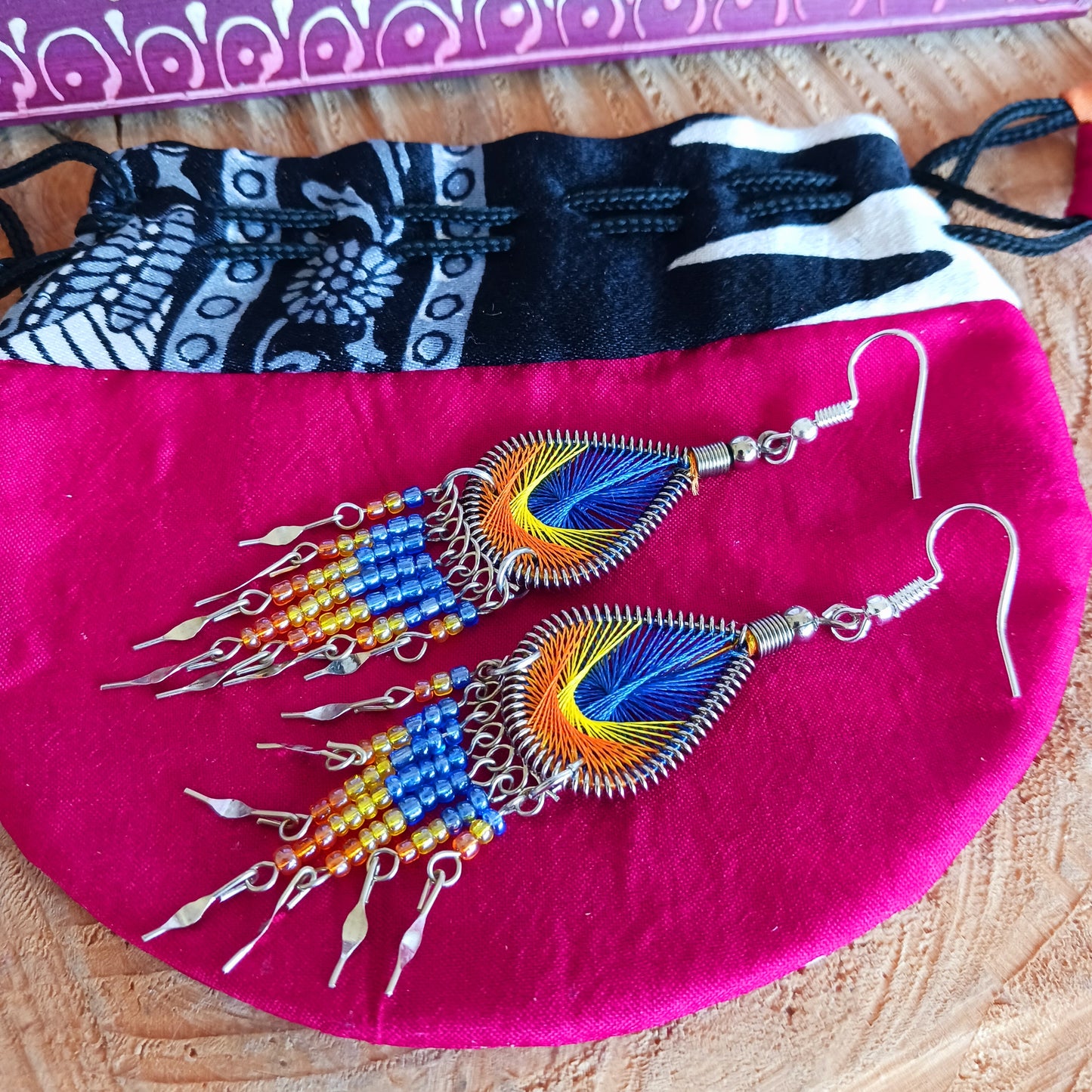 Our earrings are sourced from ethical and small family businesses, the eye-catching variation of traditional patterns and beads and contemporary detailing enhance the jewelry to make each item unique and individual, lovingly created in small workshops in Peru.