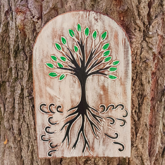 Bring meaningful symbolism and artisan beauty into your space with this chunky hand-carved wood plaque from Bali, Indonesia. Carefully crafted and painted by skilled artisans, this decorative piece features intricate etchings of the Tree of Life, a universal symbol found in many cultures and spiritual traditions.