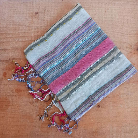 Immerse yourself in the alluring world of bohemian fashion with this delicate Indian Boho Scarf. Crafted with care, each scarf captures the essence of India's free-spirited charm, adding a touch of Boho elegance to your outfit.