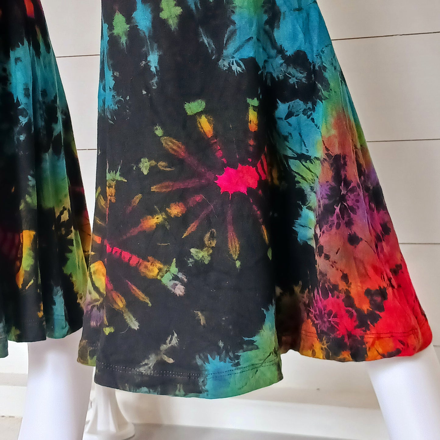 Get your groove on with these funky tie dye bell bottom leggings. They’re super comfy and stretchy and that little bit of a stretch in the fabric means they hold their shape so always look stunning. From yoga poses to festival adventures and dance performances, these leggings provide a versatile fashion choice if you’re seeking both comfort and flair.