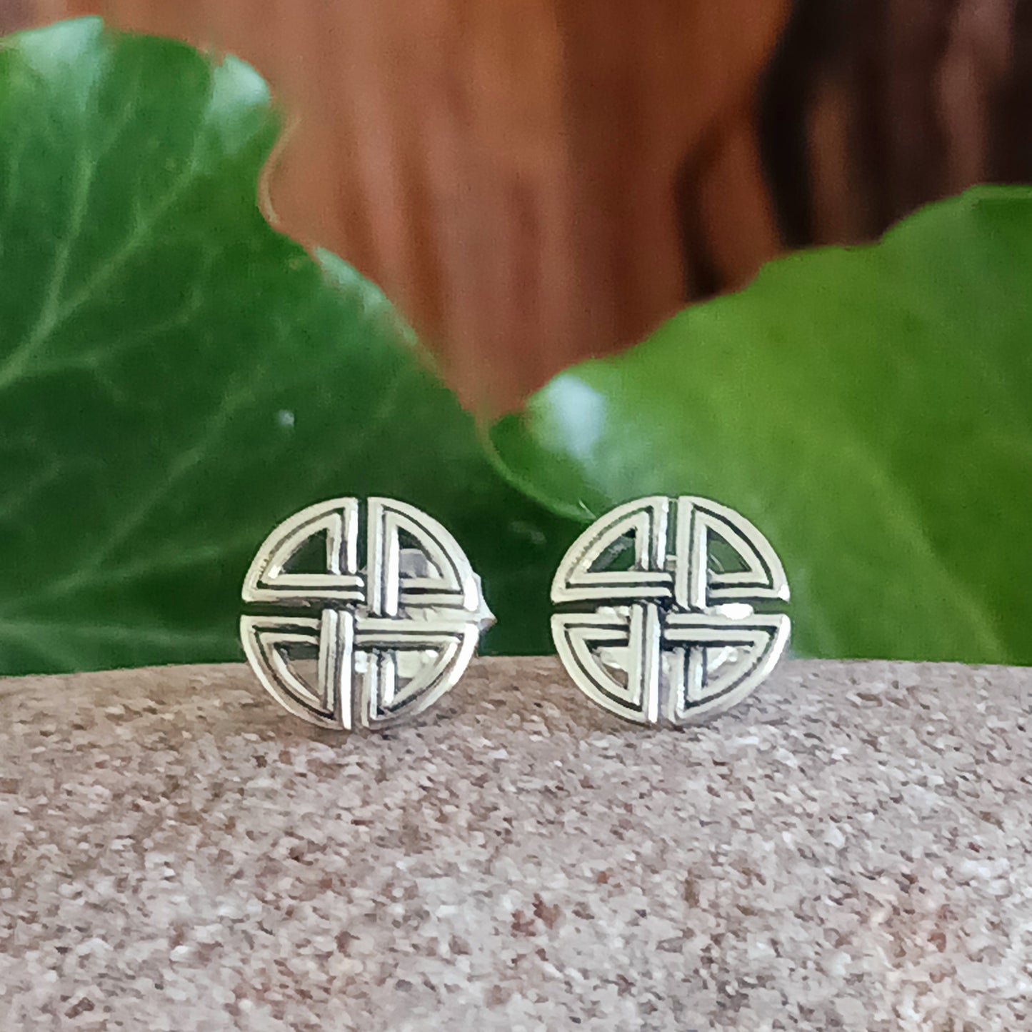 Beautifully crafted 925 sterling silver Celtic stud earrings, featuring ancient Celtic artwork translated into intricate jewellery. A timeless piece, rich in history and symbolic meaning.