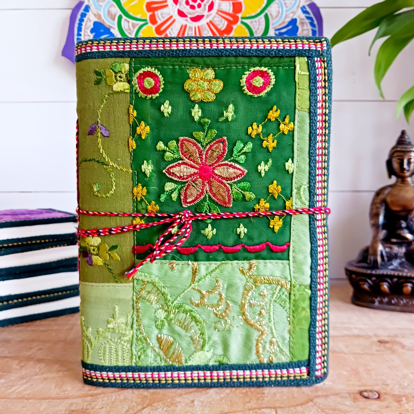 This beautifully bound notebook with handmade paper is from recycled cotton. An imaginative use for sari offcut material, the cover is edged and framed with pretty brocade material to complete a lovely and unique eco friendly stationery gift.
