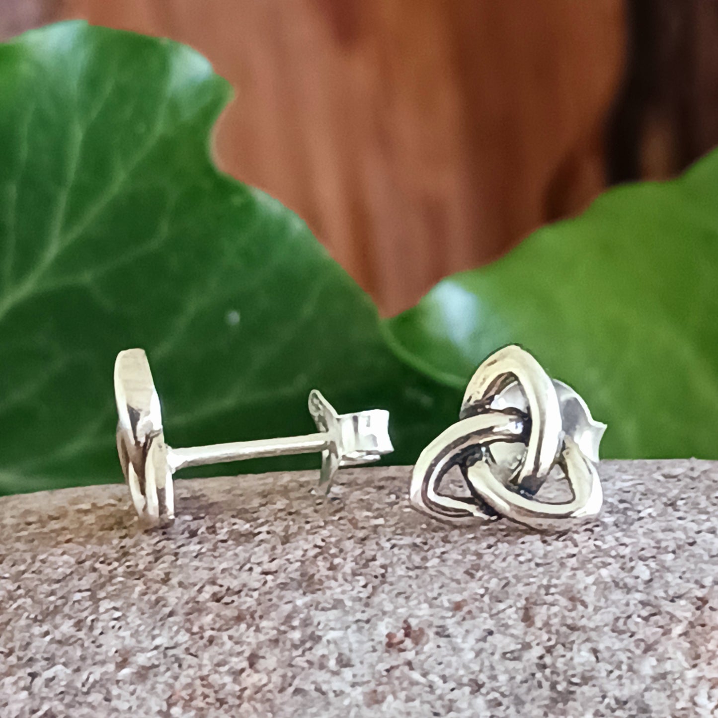 Beautifully crafted 925 sterling silver Celtic stud earrings, featuring ancient Celtic Knot artwork translated into intricate jewellery. A timeless piece, rich in history and symbolic meaning.