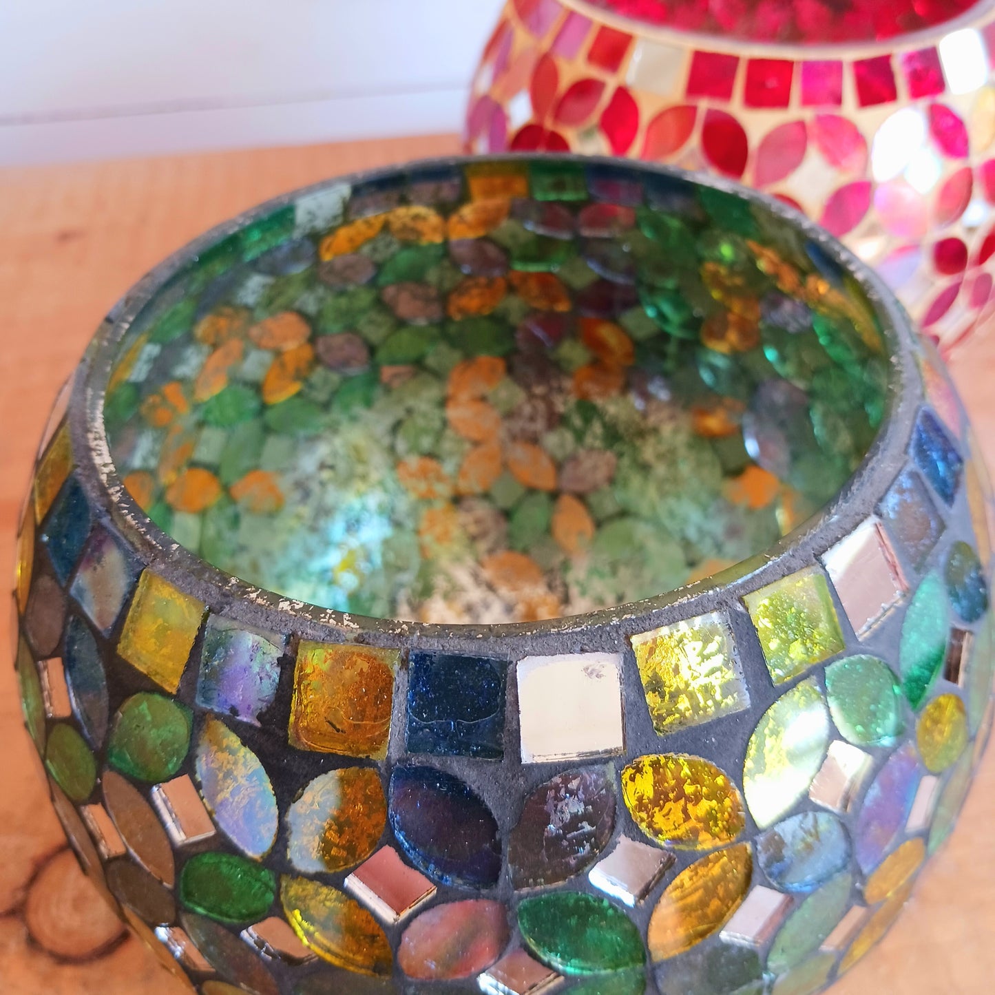 Add a warm, colourful glow to your home with this large and beautiful handmade Meena mosaic glass tealight holder, crafted by a World Fair Trade Organisation (WFTO) approved supplier in India.