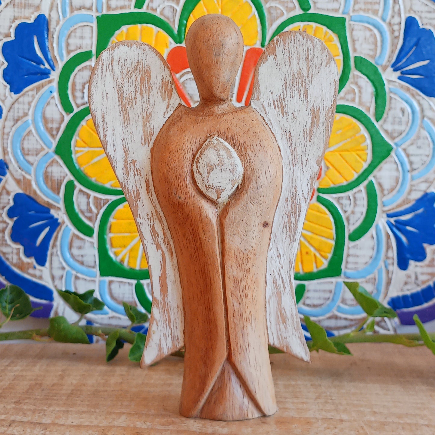 Hati-Hati Angels make beautiful, cultural and caring gifts. Every angel has been carefully carved by hand, sun dried, finished, polished and painted by artisans in rural areas, Hat-hati is a common Indonesian word meaning take care.