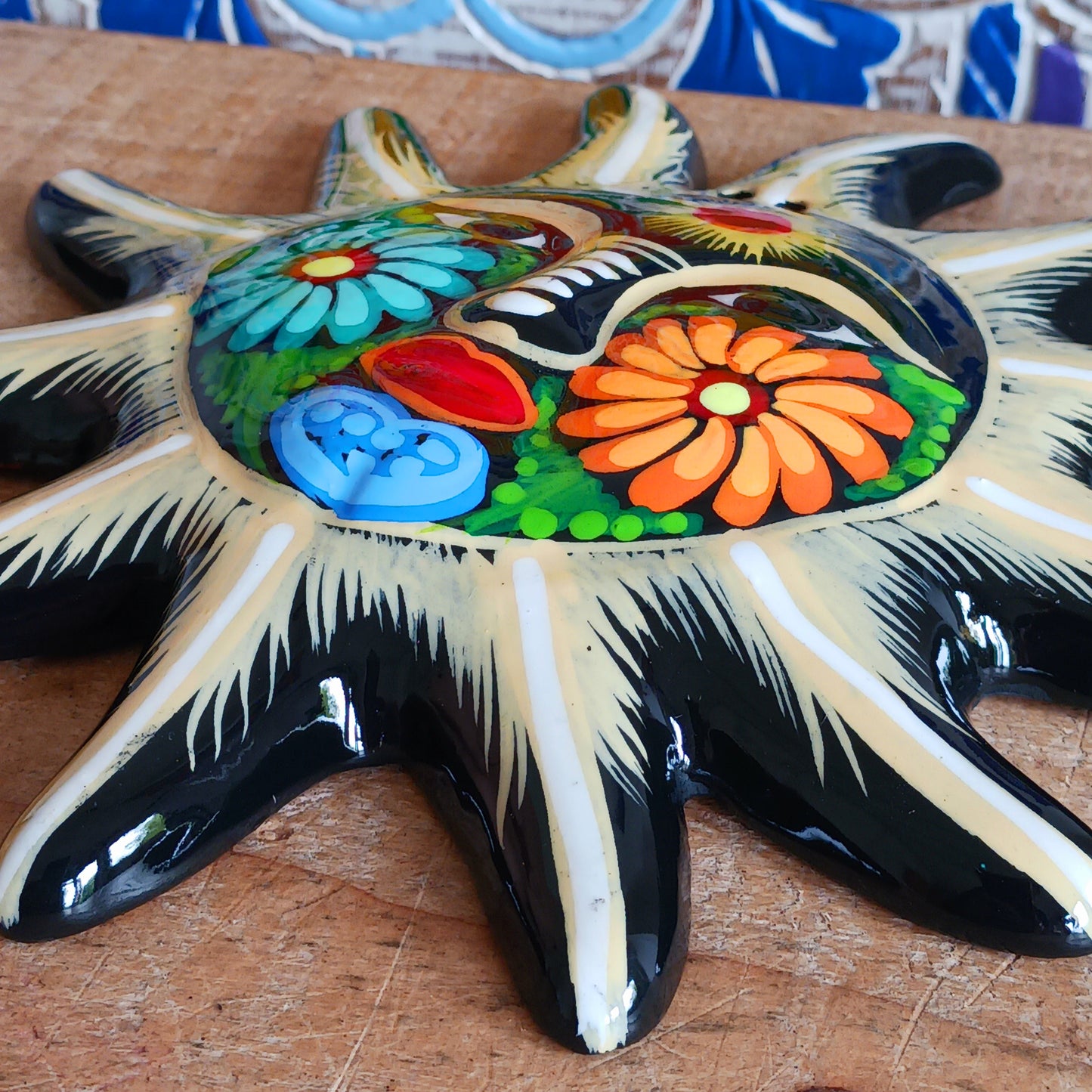 Add a burst of colour with this vibrant, hand-painted Xalitla wall plaque. Traditional Mexican folk art with a glossy finish and easy hanging design.