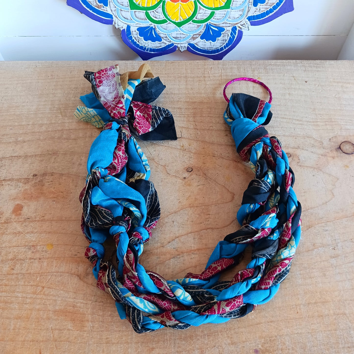 These beautiful sari plant hangers will add a splash of colour and boho chic to your home. Made from scraps of used sari, their simple design ensures that no fabric is wasted but is re-purposed into an elegant product.