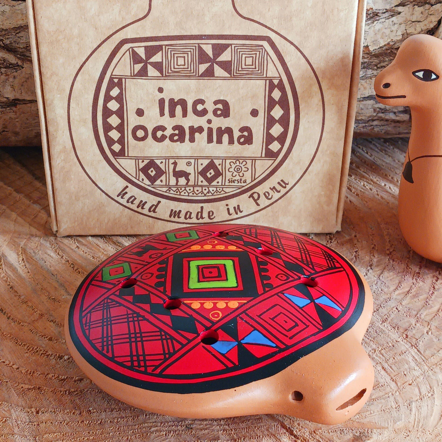 Experience the timeless sound of ancient cultures with these gorgeous ocarinas, handcrafted from fired clay in Peru. Adorned with vibrant, traditional designs, they are a favourite among musicians.