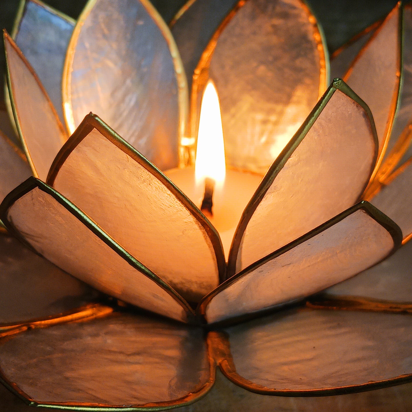 A perfect gift or centerpiece, this lotus candle holder blends mindful design with timeless charm.