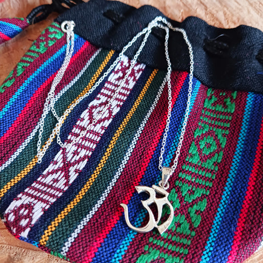 This classic sterling silver Om pendant on a sterling silver chain is intended to calm the mind and bring spiritual knowledge and insight.  Handcrafted for durability and designed to last a lifetime.