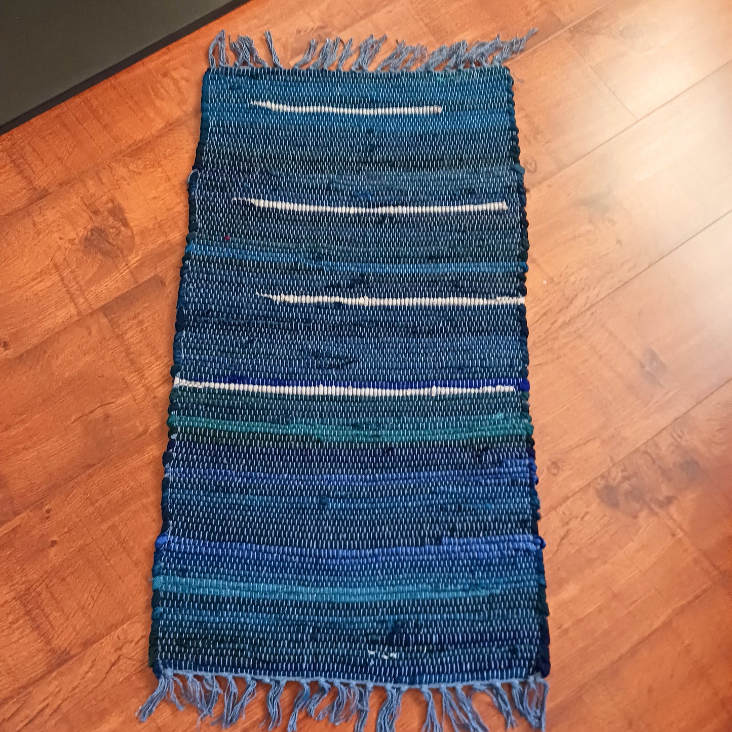 Enhance your living space with this premuim quality rag rug. Whether used in kitchens, bathrooms, or even as a decorative accent in bedrooms and living rooms, the charcoal greys impart an air of sophistication and modernity to any setting.