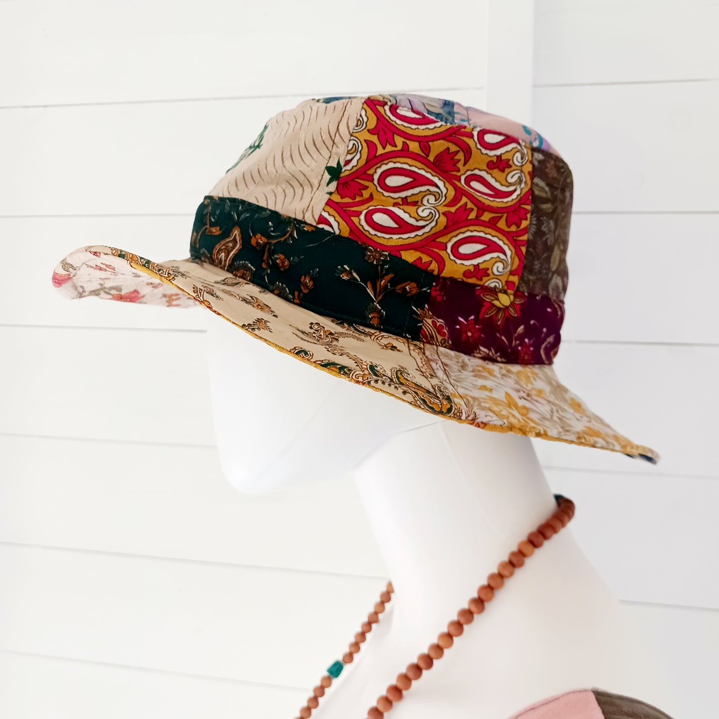 A swell little number for festivals and summer times, you'll look the coolest in this recycled sari patchwork sun hat. Black polyester lined, with a slightly flexible brim for adjusting the shape.