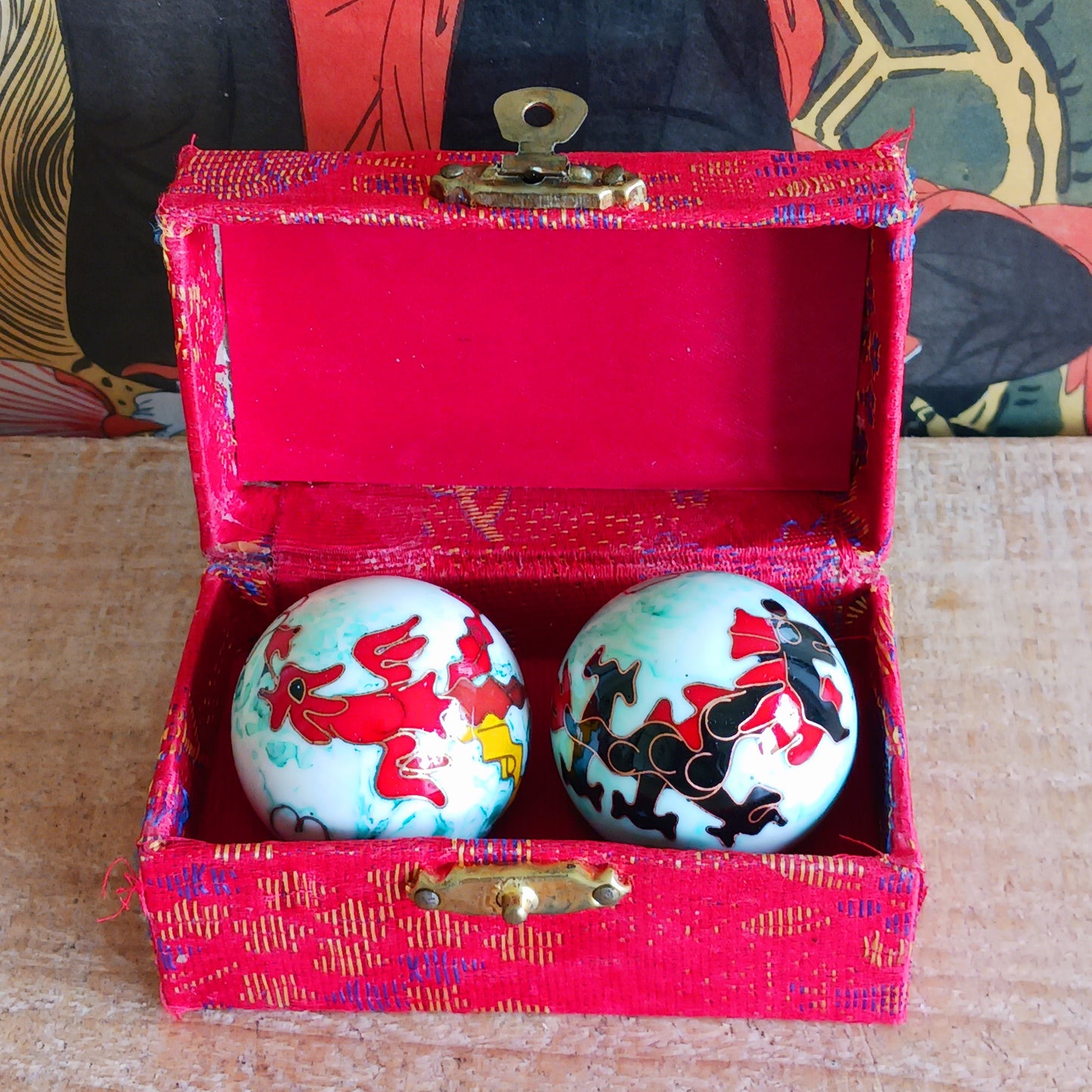 Boost hand flexibility and focus with Chinese Health Balls. Includes 2 chime balls in a silk brocade box. Ideal for relaxation, therapy, and energy balance.