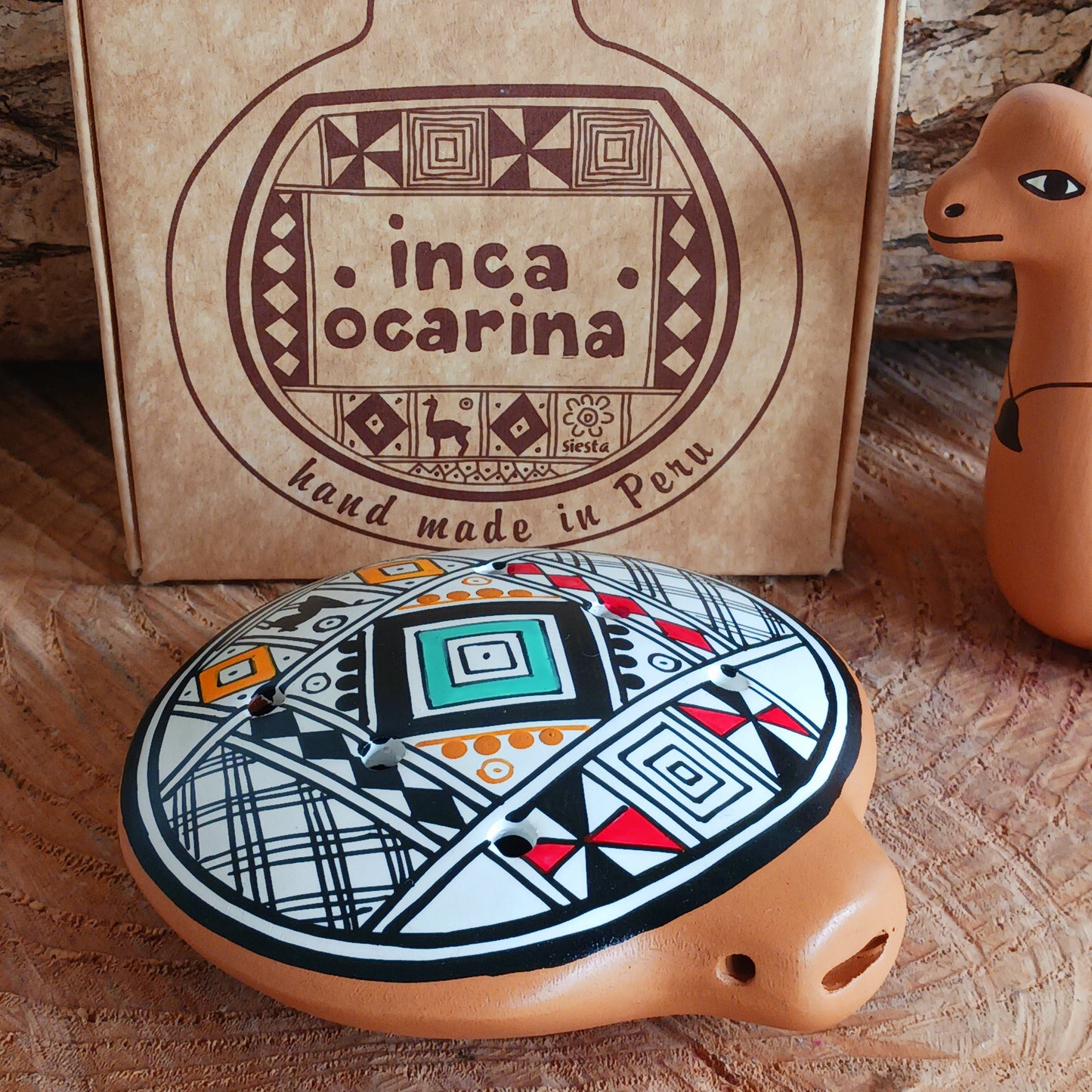 Experience the timeless sound of ancient cultures with these gorgeous ocarinas, handcrafted from fired clay in Peru. Adorned with vibrant, traditional designs, they are a favourite among musicians.