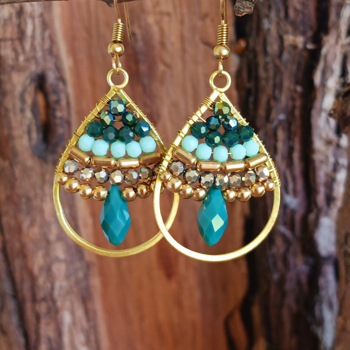 These pretty beaded earrings are so bohemian chic and add effortless style to your outfit. The beads sparkle gently when the light catches them, making them a great evening accessory as well as daytime. They are finished with gold plated hooks.