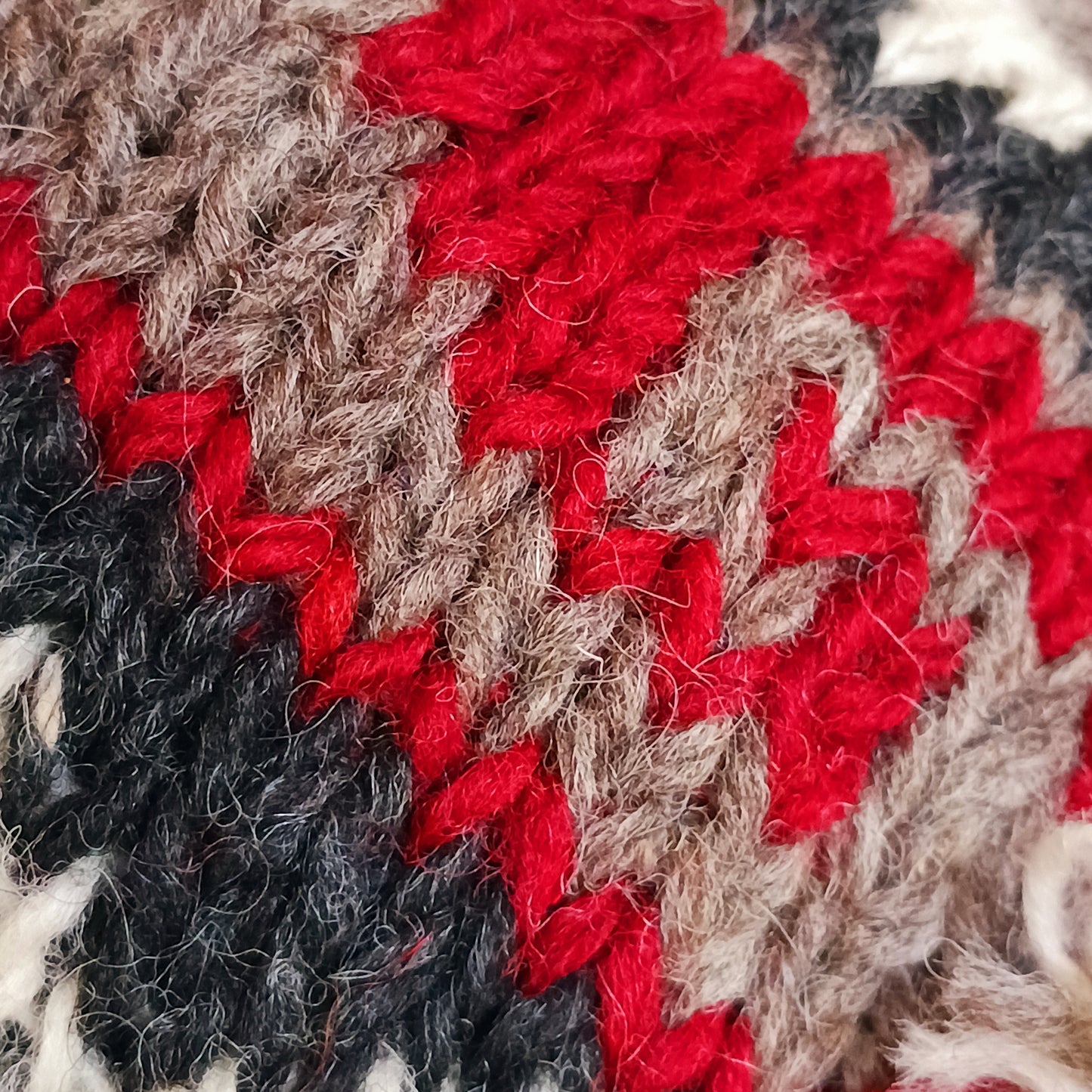 Stay cozy and stylish with our handmade chunky wool earflap hats, crafted in Nepal by skilled women artisans in Kathmandu. Each hat is 100% pure wool and features a soft polar fleece lining for extra warmth and comfort. Perfect for cold winter days, outdoor adventures, or adding a touch of handmade charm to your look.