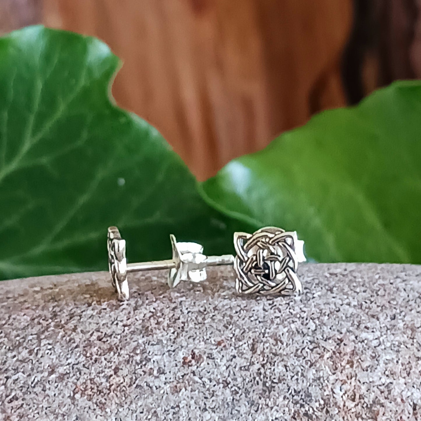 Beautifully crafted 925 sterling silver Celtic stud earrings, featuring ancient Celtic Knot artwork translated into intricate jewellery. A timeless piece, rich in history and symbolic meaning.