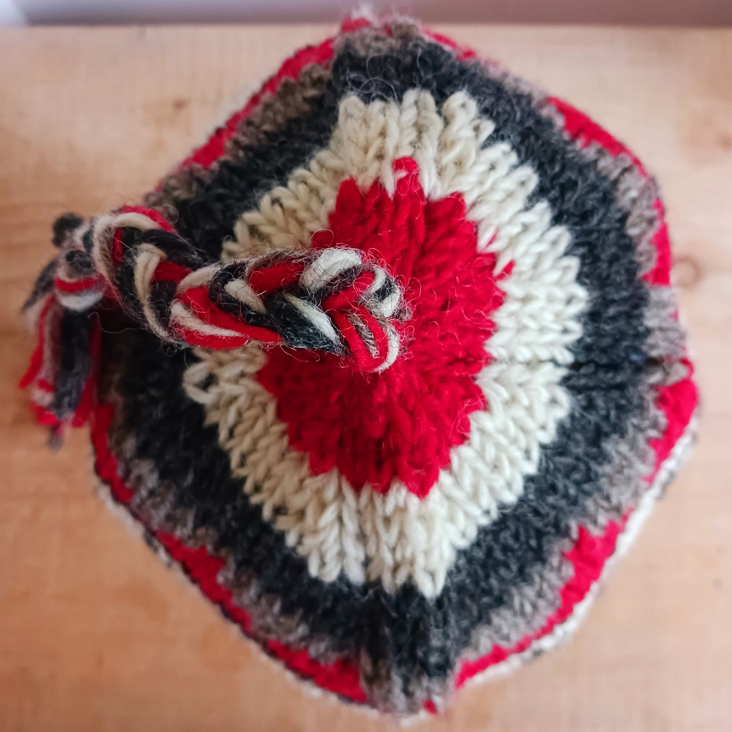 Stay cozy and stylish with our handmade chunky wool earflap hats, crafted in Nepal by skilled women artisans in Kathmandu. Each hat is 100% pure wool and features a soft polar fleece lining for extra warmth and comfort. Perfect for cold winter days, outdoor adventures, or adding a touch of handmade charm to your look.