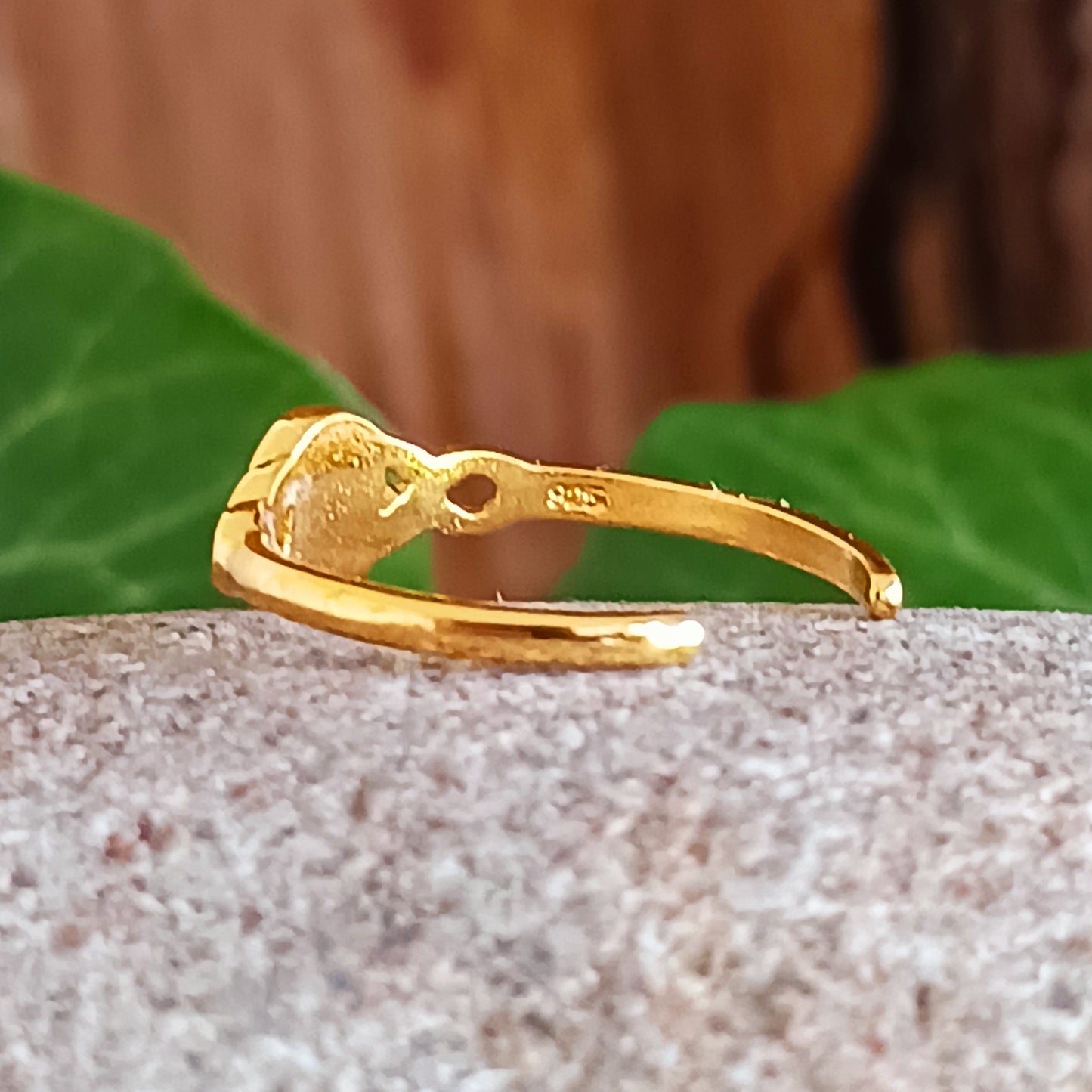 Gold plated Toe Ring with pretty fire stone. Add a little bit of glamour to your toes with our lovely toe ring, beautifully presented in a little fabric drawstring pouch made from off cuts from sari materials that would have otherwise been discarded.