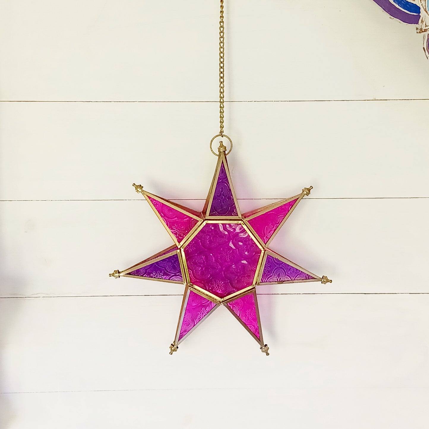 These Moroccan style star glass lanterns are handcrafted by skilled artisans and come in beautiful rich colours that catch the eye and instantly add atmosphere to any room.