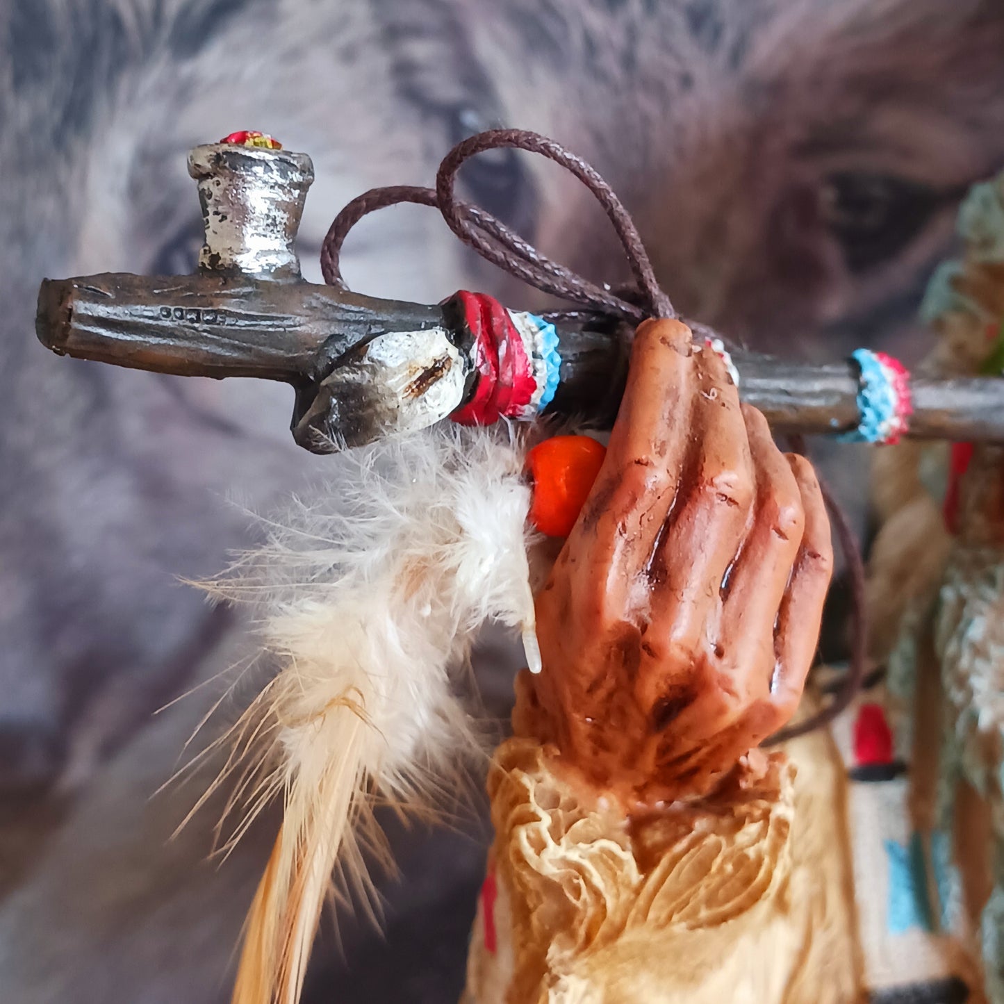 Elevate your space with the serene elegance of this Native American Chief Smoking a Peace Pipe figurine, a captivating symbol of wisdom and cultural harmony. Expertly crafted with intricate detail, this masterpiece depicts a noble chief in traditional tribal attire, smoking a symbolic peace pipe with grace and dignity. From the regal feathered headdress to the delicate carving of the pipe, every element reflects the artistry and cultural depth of Native American traditions.