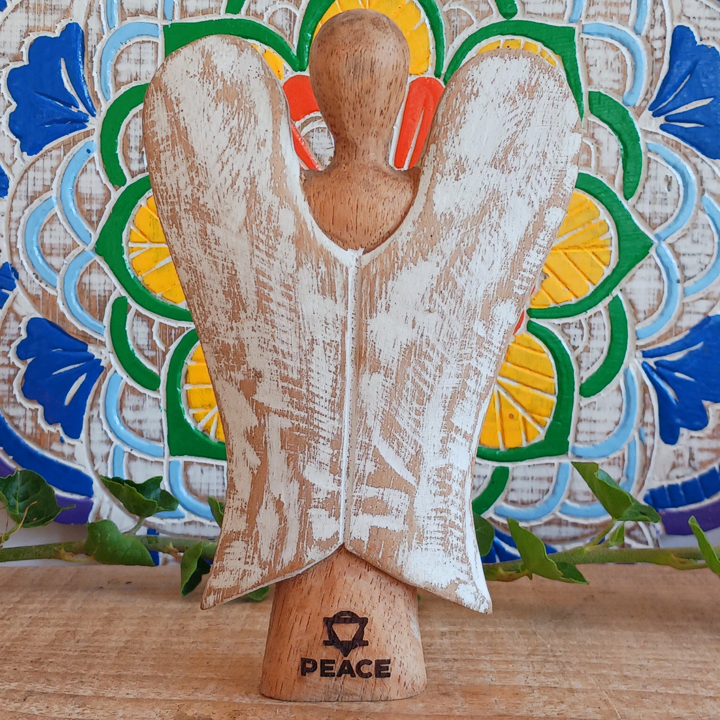 Hati-Hati Angels make beautiful, cultural and caring gifts. Every angel has been carefully carved by hand, sun dried, finished, polished and painted by artisans in rural areas, Hat-hati is a common Indonesian word meaning take care.