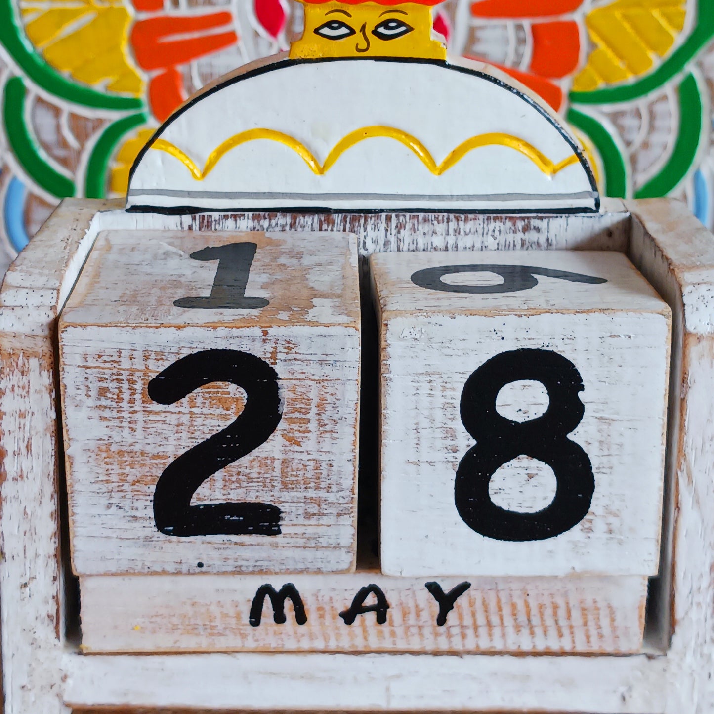 Bring a sprinkle of harmony to your everyday routine with the Nepal Stupa Wooden Calendar. Crafted from lightweight, durable wood, this enchanting piece combines functionality with fairy-tale charm. Each day, simply rotate the wooden blocks to keep track of the date—no need for replacements, making it a timeless addition to your home or office.