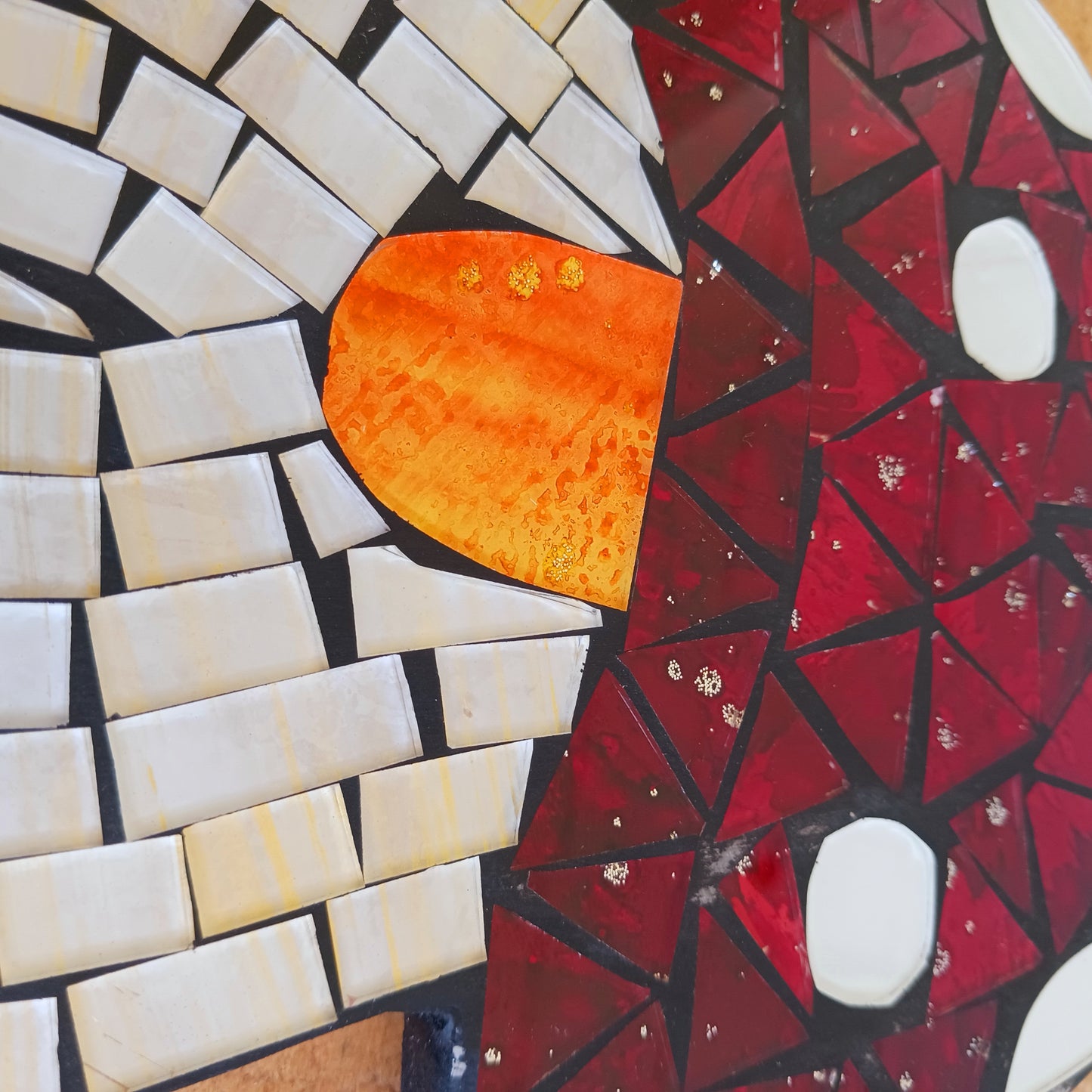 Bring personality and charm to your home with this Handcrafted Red Mosaic Gnome Wall Plaque. Featuring a delightful gnome design created with vibrant red mosaic tiles, this unique wall decoration adds a playful touch to any living space.