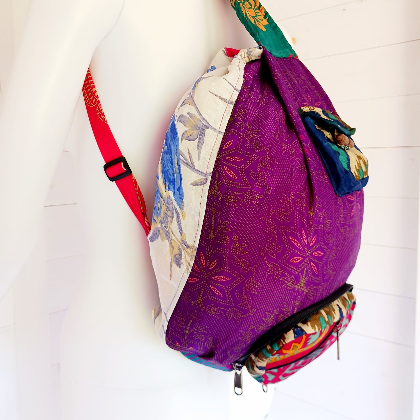 These nifty fold up backpacks are super handy. Not only do they fold down and zip away into a small compact size, but they have multiple zip and button up pouches and pockets for you to keep your essentials.