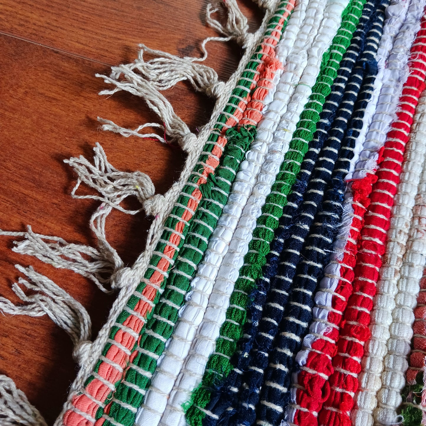 An Indian classic, this multi-coloured cotton and viscose striped rag rug is made from recycled materials and is machine-washable.